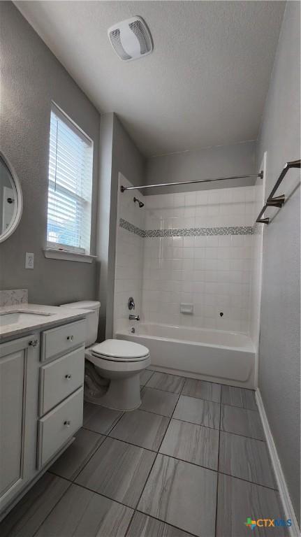 9012 Lonesome Oak Dr, Temple, TX 76502 - bathroom featuring toilet, vanity, and tub / shower combination