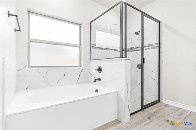 bathroom with independent shower and bath