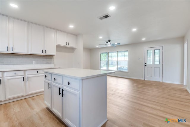 3524 Swan St, Fort Worth, TX 76117 - kitchen with light wood-style floors, recessed lighting, ceiling fan, light countertops, and decorative backsplash