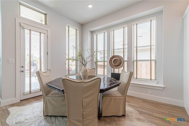 dining room with light wood-type flooring