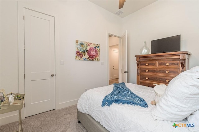 carpeted bedroom featuring ceiling fan