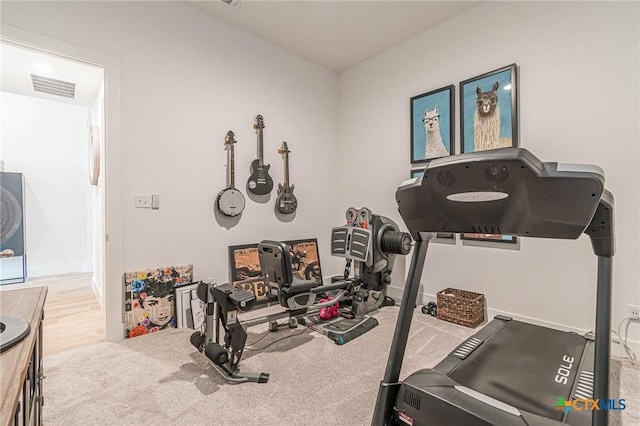 workout room with carpet flooring