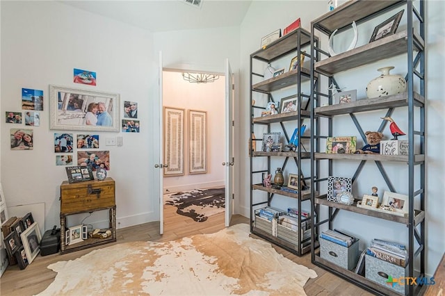 interior space with hardwood / wood-style flooring