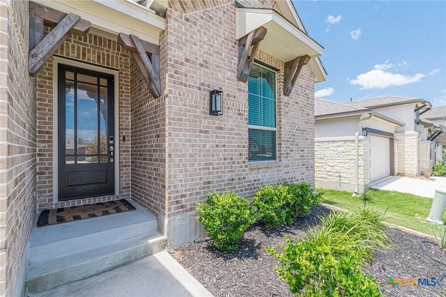 property entrance featuring a garage