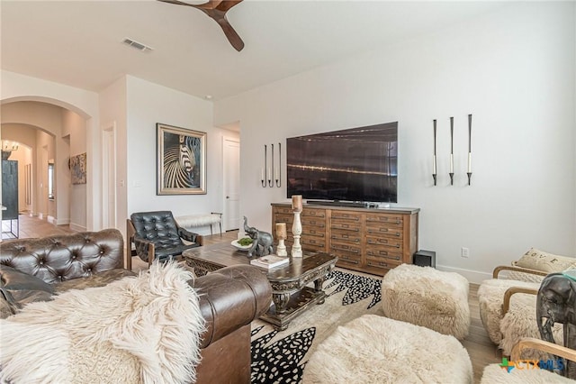 living room with ceiling fan