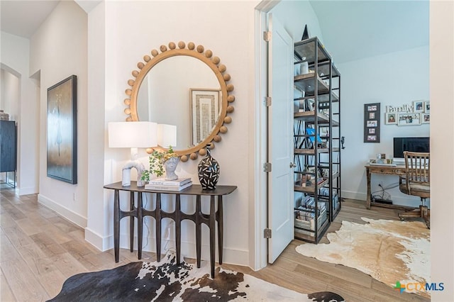 hallway featuring light hardwood / wood-style floors