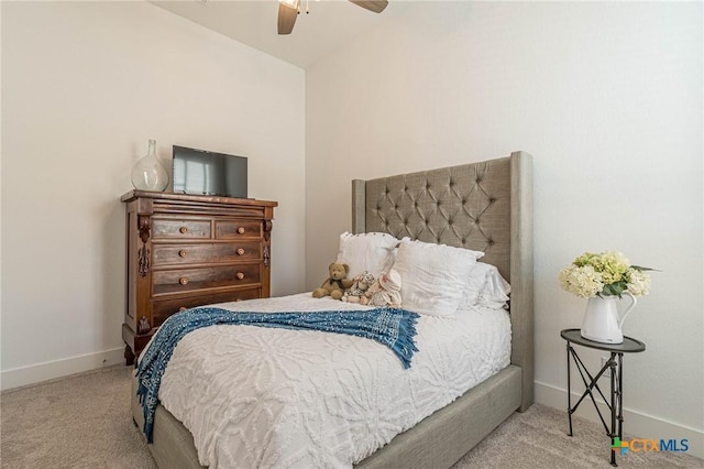 carpeted bedroom with lofted ceiling and ceiling fan