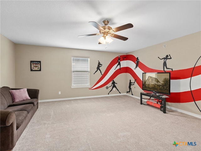 playroom with ceiling fan and carpet floors