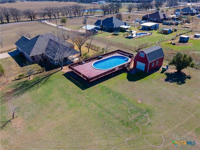 view of pool with an outdoor structure