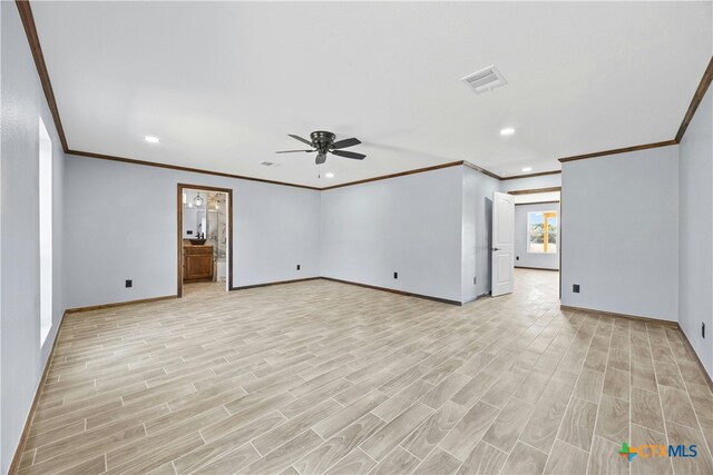 unfurnished living room with ornamental molding, light hardwood / wood-style flooring, and ceiling fan