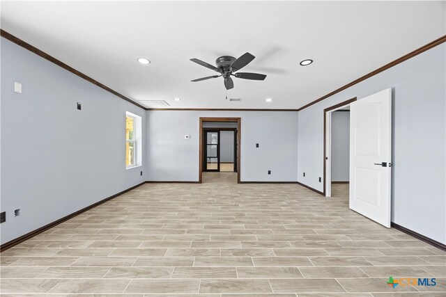 unfurnished room featuring ornamental molding, light hardwood / wood-style flooring, and ceiling fan