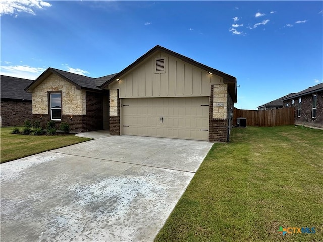 3104 Gryffindor Ln, Killeen, TX 76549 - ranch-style house with a garage, driveway, cooling unit, brick siding, and board and batten siding