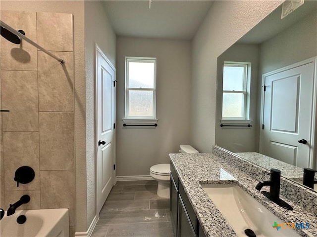3104 Gryffindor Ln, Killeen, TX 76549 - bathroom featuring toilet, vanity, healthy amount of natural light, and shower / bathtub combination
