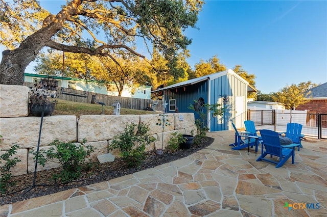 view of patio / terrace with an outdoor structure