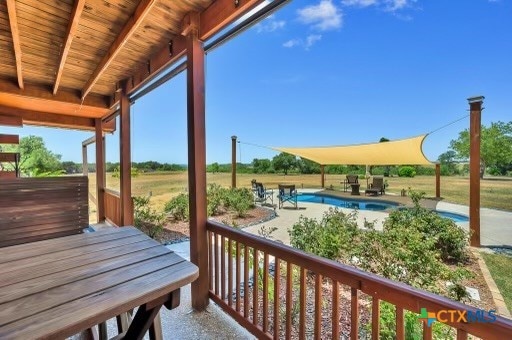 balcony featuring a patio