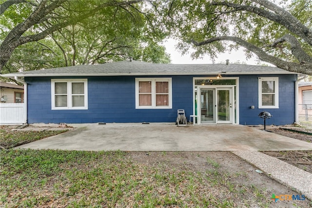 rear view of property with a patio area