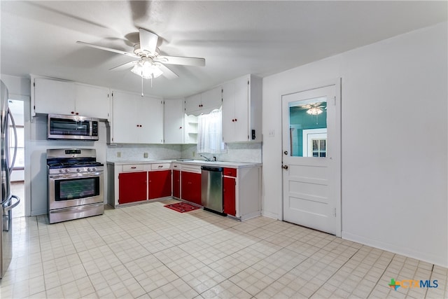 kitchen featuring ceiling fan, white cabinetry, appliances with stainless steel finishes, and tasteful backsplash