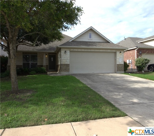 2005 Granite Springs Rd, Leander, TX 78641 - ranch-style home with a garage, concrete driveway, a front yard, and a shingled roof