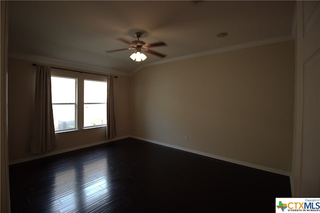 unfurnished room with dark hardwood / wood-style flooring, ornamental molding, and ceiling fan