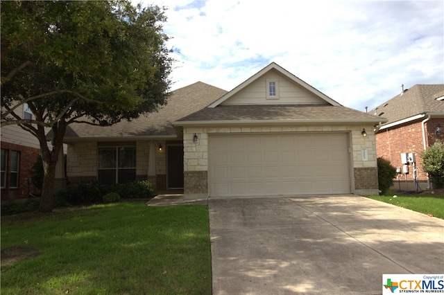 2005 Granite Springs Rd, Leander, TX 78641 - view of front of house featuring brick siding, an attached garage, concrete driveway, roof with shingles, and a front lawn