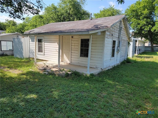 205 Hill St, Copperas Cove, TX 76522 - view of front facade with a front lawn and a patio