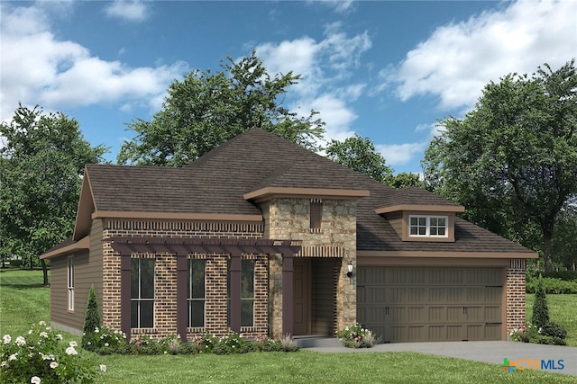 view of front of house featuring a garage and a front lawn