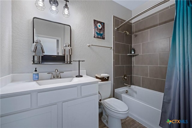 2023 Chilton Hall, San Antonio, TX 78253 - bathroom with a textured wall, wood finished floors, toilet, vanity, and shower / tub combo