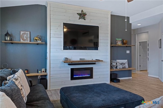 2023 Chilton Hall, San Antonio, TX 78253 - living room with baseboards, recessed lighting, a ceiling fan, wood finished floors, and a fireplace