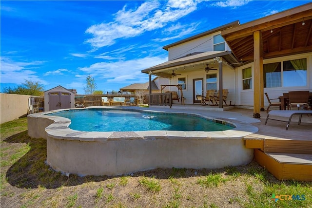 2023 Chilton Hall, San Antonio, TX 78253 - view of pool featuring a storage shed, a fenced backyard, an outbuilding, a fenced in pool, and ceiling fan