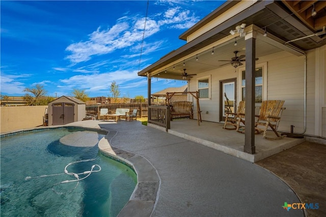 2023 Chilton Hall, San Antonio, TX 78253 - view of swimming pool featuring a fenced backyard, ceiling fan, a patio area, and a storage unit
