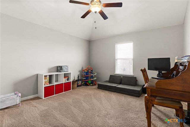 rec room featuring carpet, vaulted ceiling, and ceiling fan