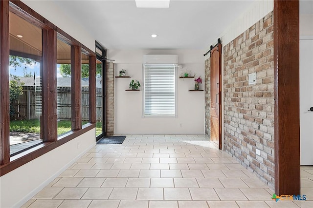 221 W Tanglewood Dr, New Braunfels, TX 78130 - unfurnished sunroom with a barn door