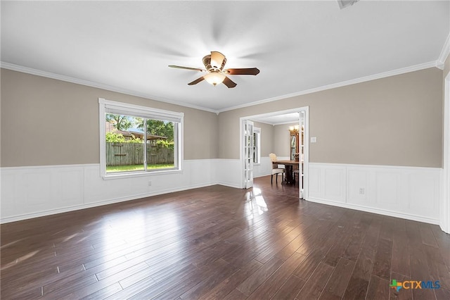 221 W Tanglewood Dr, New Braunfels, TX 78130 - empty room with ceiling fan, a wainscoted wall, wood finished floors, crown molding, and a chandelier