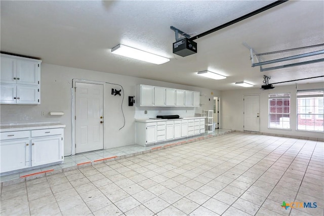 2110 Lakeview Loop, Killeen, TX 76543 - garage with a garage door opener