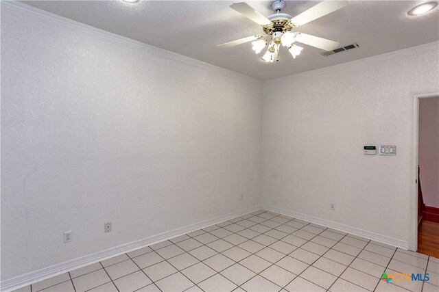 2110 Lakeview Loop, Killeen, TX 76543 - unfurnished room with crown molding, a ceiling fan, visible vents, and baseboards