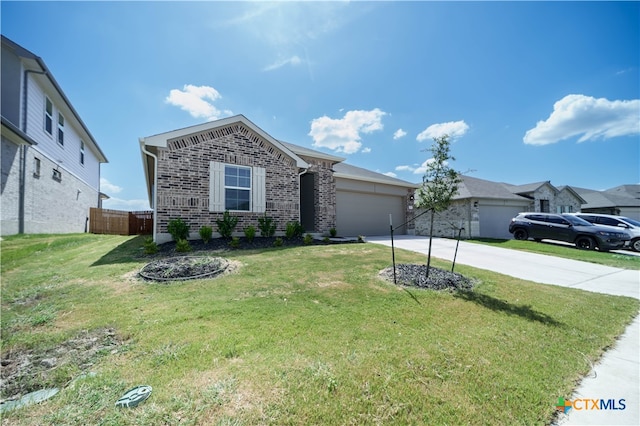 view of front of house with a front lawn and a garage