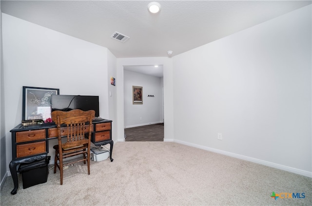 view of carpeted home office