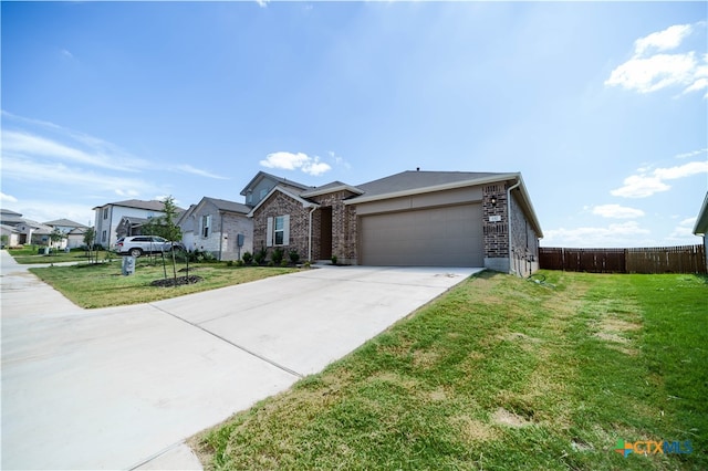 ranch-style house with a garage and a front yard