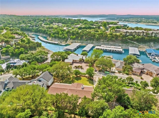 aerial view at dusk with a water view