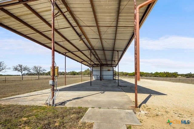 view of patio featuring a carport