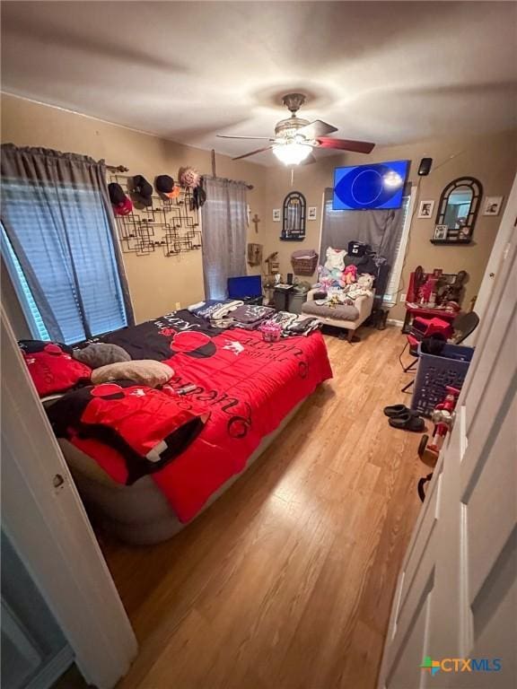 3514 Old Goliad Rd, Victoria, TX 77905 - bedroom featuring wood finished floors and a ceiling fan