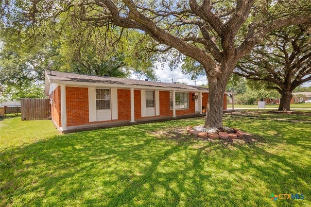 4811 Lilac Ln, Victoria, TX 77904 - view of front facade with brick siding
