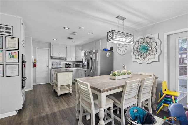 4811 Lilac Ln, Victoria, TX 77904 - dining space featuring dark wood-style flooring and recessed lighting