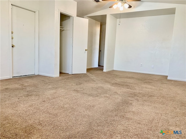 unfurnished bedroom featuring ceiling fan and carpet