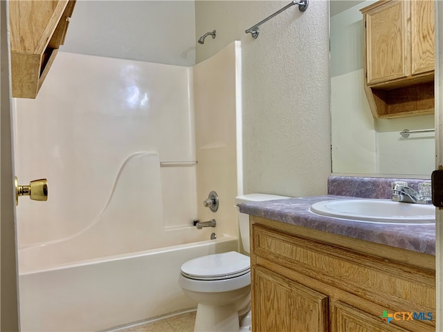 full bathroom with tile patterned floors, vanity, toilet, and shower / washtub combination