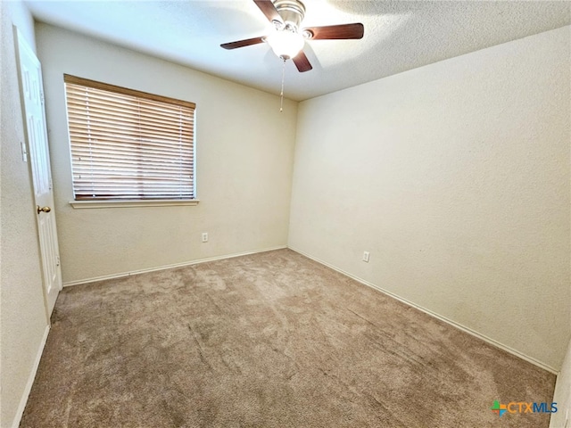 empty room featuring carpet flooring