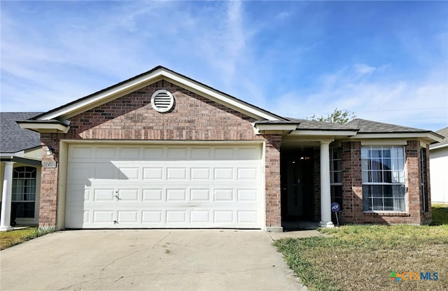 single story home featuring a garage