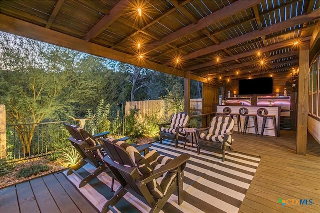 wooden terrace featuring an outdoor bar