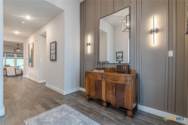 bathroom featuring vanity, hardwood / wood-style floors, and ceiling fan with notable chandelier