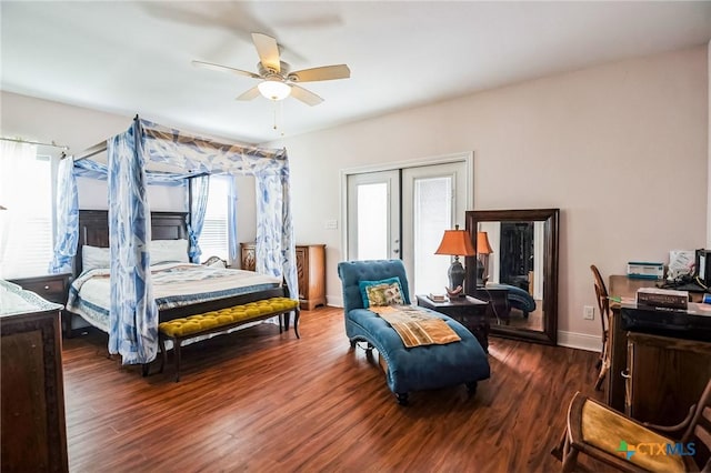 bedroom with hardwood / wood-style flooring, french doors, and ceiling fan